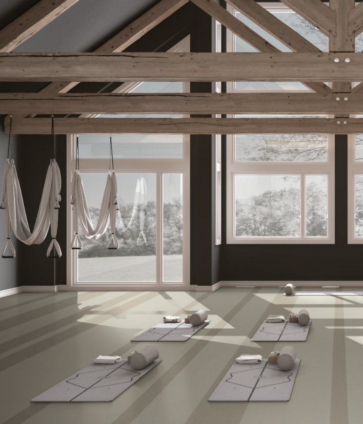 Sunlit interior with Zandur flooring and exposed timber structure